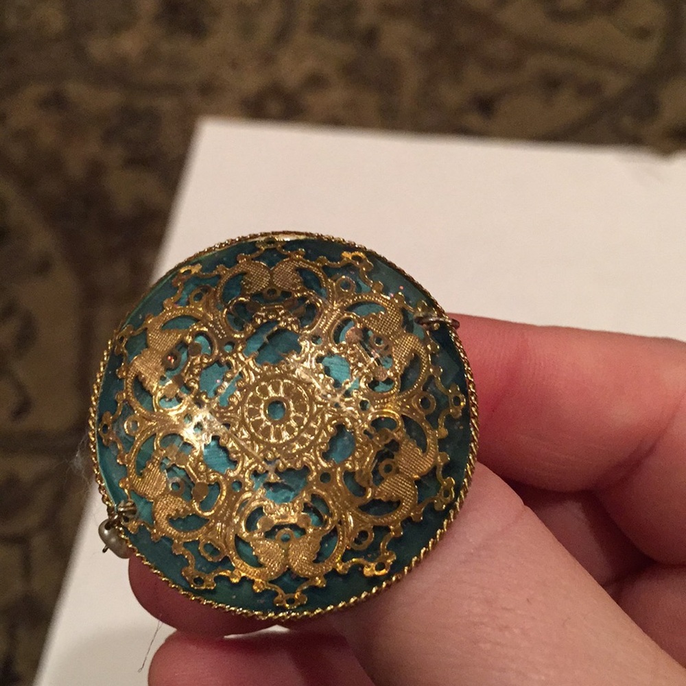 Gold and teal color ring